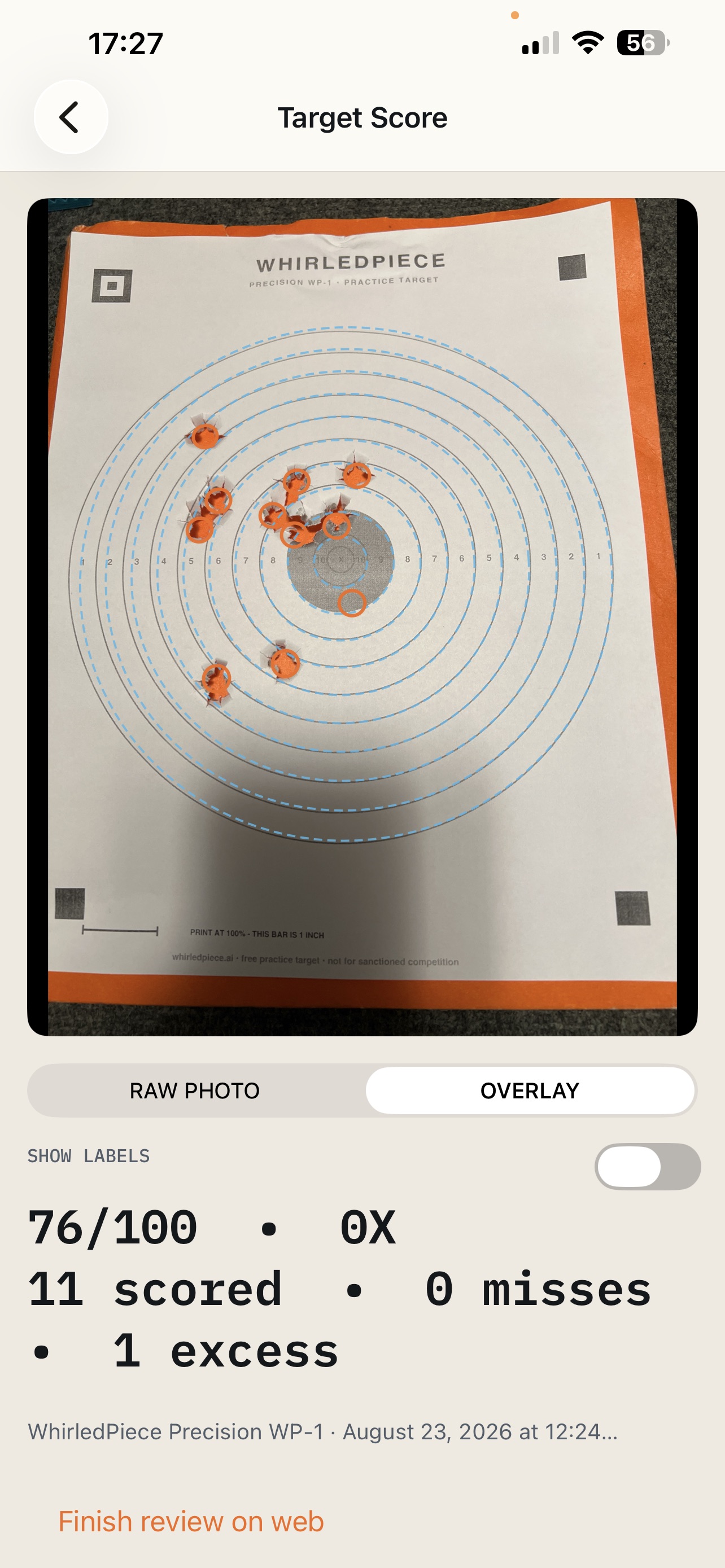 iPhone result showing a photographed WP-1 with rings, proposed marks and a score